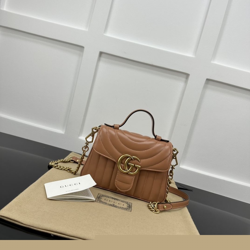 G*u*i top handle bags